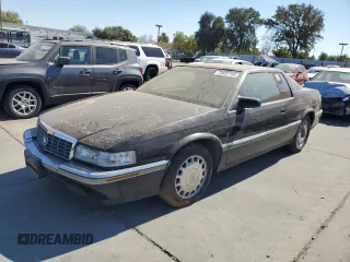1994 Cadillac Eldorado z VIN 1G6EL12Y5RU601760, wystawiony jako Copart lot #73837144 z przebiegiem Nie podano mil oraz Szkoda całkowita • Salvage title. Historia ofert i sprzedaży dostępna na DreamBid. Obrazek 1.