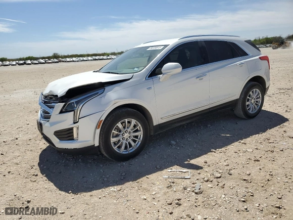 2019 Cadillac XT5 FWD with VIN 1GYKNARS0KZ121284, listed as a Copart auction lot 49339815 with 56,759 mi miles and Salvage Title. Bid and sale history available at carsss.com. Image 1.