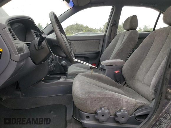 2003 Hyundai Elantra GLS z VIN KMHDN45D63U594320, wystawiony jako Copart lot #58742565 z przebiegiem 163 772 mil mil oraz Szkoda całkowita • Salvage title. Historia ofert i sprzedaży dostępna na DreamBid. Obrazek 7.