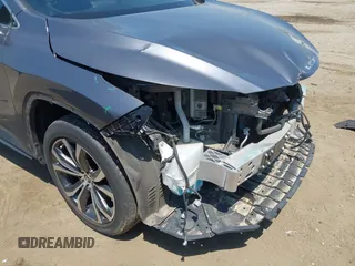 2021 Lexus RX 450h with VIN 2T2HGMDA6MC065516, listed as a IAAI auction lot 42162407 with 81,501 mi miles and . Bid and sale history available at DreamBid. Image 18.