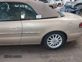 2001 Chrysler Sebring z VIN 1C3EL45U11N673923, wystawiony jako IAAI lot #41554949 z przebiegiem Nie podano mil oraz . Historia ofert i sprzedaży dostępna na DreamBid. Obrazek 6.