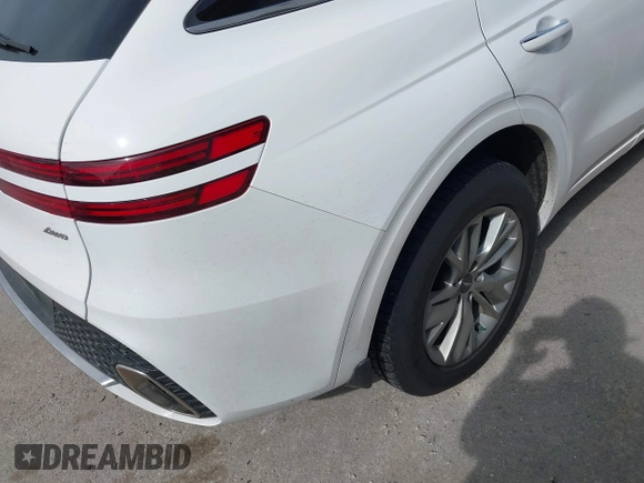 2022 Genesis GV70 2.5T with VIN KMUMADTB0NU043317, listed as a IAAI auction lot 42222034 with 30,566 mi miles and . Bid and sale history available at DreamBid. Image 12.