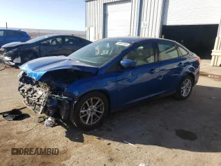 2018 Ford Focus SE z VIN 1FADP3F2XJL327387, wystawiony jako Copart lot #46927835 z przebiegiem 61 707 mil mil oraz Szkody całkowita. Historia ofert i sprzedaży dostępna na DreamBid. Obrazek 1.