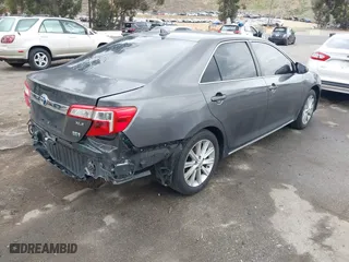 2013 Toyota Camry Hybrid LE with VIN 4T1BD1FK1DU091687, listed as a IAAI auction lot 42046450 with 211,895 mi miles. Bid and sale history available at carsss.com. Image 4.