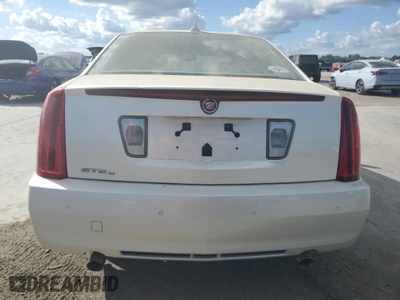2010 Cadillac STS AWD z VIN 1G6DU6EV9A0138248, wystawiony jako Copart lot #85649154 z przebiegiem 137 227 mil mil oraz Nie do naprawy • Non repairable. Historia ofert i sprzedaży dostępna na DreamBid. Obrazek 6.