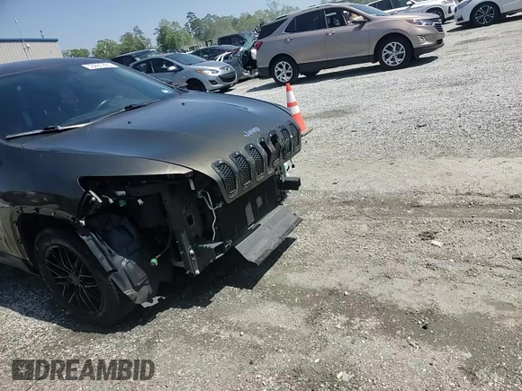 2015 Jeep Cherokee Sport with VIN 1C4PJLAB9FW720187, listed as a Copart auction lot 53091225 with 154,545 mi miles and Salvage Title. Bid and sale history available at carsss.com. Image 14.