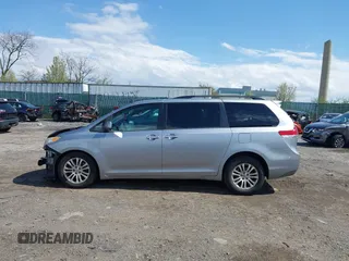 2013 Toyota Sienna XLE AAS with VIN 5TDYK3DC5DS375095, listed as a IAAI auction lot 42042334 with 130,633 mi miles. Bid and sale history available at carsss.com. Image 14.