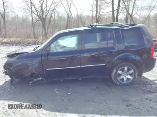 2012 Honda Pilot Touring with VIN 5FNYF4H93CB071923, listed as a IAAI auction lot 41946074 with 175,663 mi miles and . Bid and sale history available at carsss.com. Image 14.