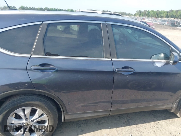 2013 Honda CR-V EX-L with VIN 2HKRM3H78DH505680, listed as a IAAI auction lot 42101780 with 201,721 mi miles and . Bid and sale history available at DreamBid. Image 13.