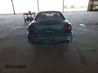 1999 Pontiac Grand Am SE with VIN 1G2NE52T1XC572008, listed as a Copart auction lot 61776375 with Not provided miles and Clean title. Bid and sale history available at DreamBid. Image 6.