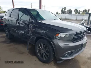 2017 Dodge Durango GT with VIN 1C4RDJDG3HC936794, listed as a IAAI auction lot 41794497 with 131,635 mi miles and . Bid and sale history available at carsss.com. Image 1.