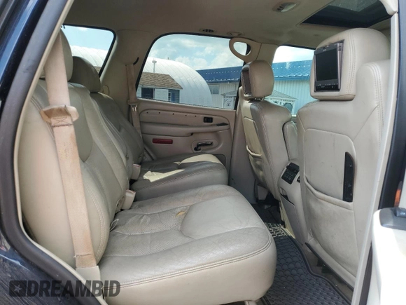 2005 Cadillac Escalade z VIN 1GYEK63NX5R163942, wystawiony jako Copart lot #55406495 z przebiegiem 231 861 mil mil oraz Szkoda całkowita • Salvage title. Historia ofert i sprzedaży dostępna na DreamBid. Obrazek 11.