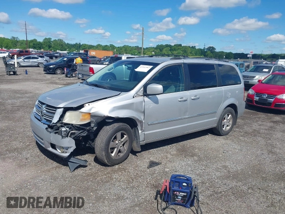 2009 Dodge Grand Caravan SXT z VIN 2D8HN541X9R663021, wystawiony jako IAAI lot #42202983 z przebiegiem 255 173 mil mil oraz . Historia ofert i sprzedaży dostępna na DreamBid. Obrazek 2.