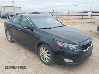 2015 Kia Optima LX with VIN 5XXGM4A71FG399420, listed as a IAAI auction lot 41928688 with 163,440 mi miles. Bid and sale history available at carsss.com. Image 1.