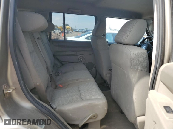 2006 Jeep Commander with VIN 1J8HG48K06C319278, listed as a Copart auction lot 60560225 with 122,920 mi miles and Salvage title. Bid and sale history available at DreamBid. Image 11.