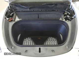 2022 Tesla Model Y Performance with VIN 7SAYGDEF7NF520825, listed as a Copart auction lot 57400245 with 55,437 mi miles and Salvage title. Bid and sale history available at DreamBid. Image 12.