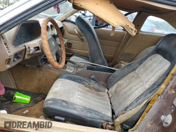 1979 Datsun 280ZX z VIN HGS130115983, wystawiony jako Copart lot #54709755 z przebiegiem 74 026 mil mil oraz Tytuł czysty. Historia ofert i sprzedaży dostępna na DreamBid. Obrazek 7.