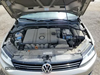 2013 Volkswagen Jetta SE z VIN 3VWDP7AJ6DM212821, wystawiony jako Copart lot #63791895 z przebiegiem 95 119 mil mil oraz Szkoda całkowita • Salvage title. Historia ofert i sprzedaży dostępna na DreamBid. Obrazek 11.