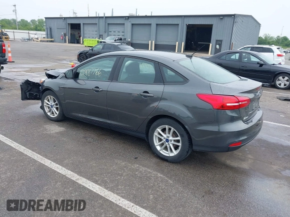 2017 Ford Focus SE with VIN 1FADP3F28HL235303, listed as a IAAI auction lot 42487766 with 92,187 mi miles and . Bid and sale history available at DreamBid. Image 3.