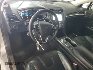 2017 Ford Fusion Hybrid Titanium with VIN 3FA6P0RU4HR223512, listed as a Copart auction lot 58739435 with 174,604 mi miles and Clean title. Bid and sale history available at DreamBid. Image 8.