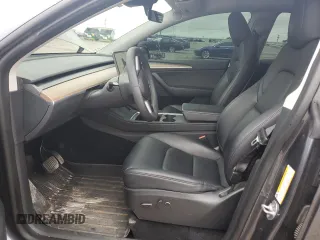 2023 Tesla Model Y Long Range z VIN 7SAYGDEE4PF752292, wystawiony jako Copart lot #53824185 z przebiegiem 61 470 mil mil oraz Szkoda całkowita • Salvage title. Historia ofert i sprzedaży dostępna na DreamBid. Obrazek 7.