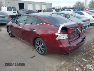 2016 Nissan Maxima SV with VIN 1N4AA6AP9GC410441, listed as a IAAI auction lot 41479069 with 74,252 mi miles and . Bid and sale history available at DreamBid. Image 3.