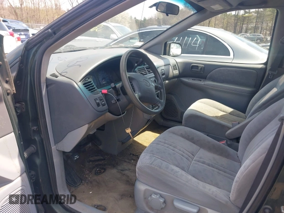 2002 Toyota Sienna LE with VIN 4T3ZF13C32U456123, listed as a IAAI auction lot 42084436 with 242,408 mi miles. Bid and sale history available at carsss.com. Image 5.