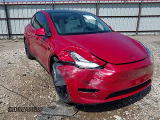 2020 Tesla Model Y Long Range z VIN 5YJYGDEE0LF034164, wystawiony jako IAAI lot #42080304 z przebiegiem 55 520 mil mil oraz . Historia ofert i sprzedaży dostępna na DreamBid. Obrazek 6.
