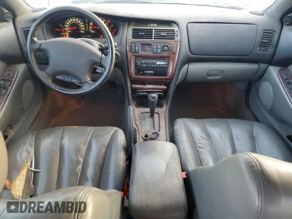2000 Mitsubishi Diamante LS z VIN 6MMAP67P5YT006608, wystawiony jako Copart lot #49009455 z przebiegiem 241 503 mil mil oraz Tytuł czysty. Historia ofert i sprzedaży dostępna na DreamBid. Obrazek 8.