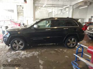 2014 Jeep Grand Cherokee Overland with VIN 1C4RJFCT7EC187319, listed as a IAAI auction lot 41256107 with 98,287 mi miles. Bid and sale history available at carsss.com. Image 14.