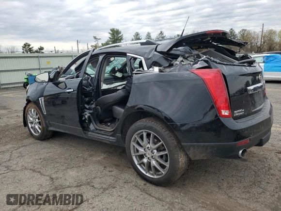 2014 Cadillac SRX Premium Collection z VIN 3GYFNGE31ES688270, wystawiony jako Copart lot #52795245 z przebiegiem 134 103 mil mil oraz Szkoda całkowita • Salvage title. Historia ofert i sprzedaży dostępna na DreamBid. Obrazek 2.