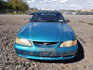 1994 Ford Mustang with VIN 1FALP4442RF186105, listed as a Copart auction lot 74677924 with 185,072 mi miles and Clean title. Bid and sale history available at DreamBid. Image 5.