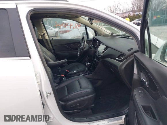 2017 Buick Encore Essence with VIN KL4CJGSB3HB014907, listed as a IAAI auction lot 41643044 with 64,769 mi miles and . Bid and sale history available at carsss.com. Image 5.