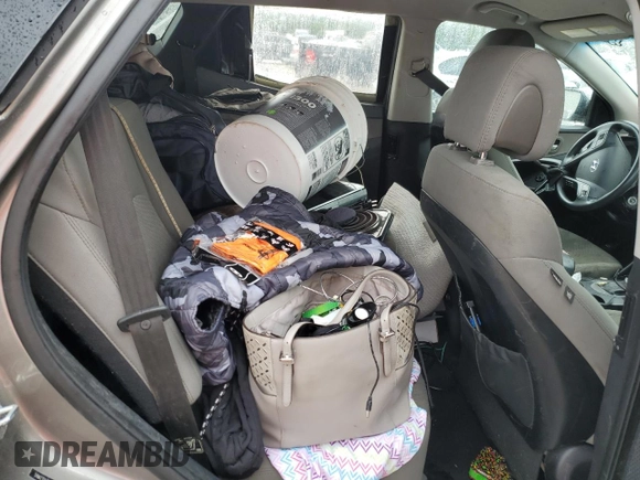 2018 Hyundai Santa Fe 2.4L z VIN 5NMZTDLB0JH087449, wystawiony jako Copart lot #58903105 z przebiegiem 114 037 mil mil oraz Szkoda całkowita • Salvage title. Historia ofert i sprzedaży dostępna na DreamBid. Obrazek 11.