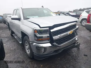 2018 Chevrolet Silverado 1500 LT with VIN 1GCVKREH6JZ360826, listed as a IAAI auction lot 41423923 with 158,170 mi miles and . Bid and sale history available at DreamBid. Image 1.
