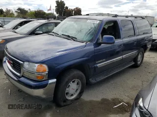 2001 GMC Yukon XL SLT z VIN 1GKFK16T41J309594, wystawiony jako Copart lot #51846074 z przebiegiem 326 660 mil mil oraz Szkoda całkowita • Salvage title. Historia ofert i sprzedaży dostępna na DreamBid. Obrazek 1.