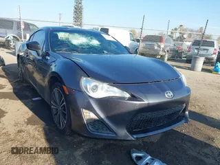 2015 Scion FR-S z VIN JF1ZNAA10F9703596, wystawiony jako IAAI lot #41403269 z przebiegiem 78 586 mil mil oraz . Historia ofert i sprzedaży dostępna na DreamBid. Obrazek 1.