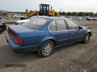 1993 Nissan Maxima z VIN JN1HJ01F8PT075754, wystawiony jako Copart lot #61406264 z przebiegiem 69 379 mil mil oraz Nie do naprawy. Historia ofert i sprzedaży dostępna na DreamBid. Obrazek 3.