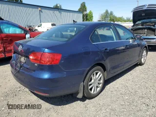 2014 Volkswagen Jetta SE with VIN 3VWD17AJ9EM323625, listed as a Copart auction lot 58211655 with 108,099 mi miles and Salvage title. Bid and sale history available at DreamBid. Image 3.