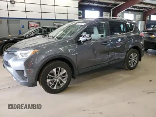 2016 Toyota RAV4 Hybrid XLE with VIN JTMRJREV0GD035203, listed as a Copart auction lot 54300225 with 153,369 mi miles and Salvage Title. Bid and sale history available at carsss.com. Image 1.
