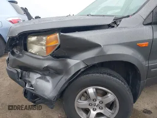 2007 Honda Pilot EX with VIN 2HKYF18497H500458, listed as a IAAI auction lot 41784273 with 114,454 mi miles. Bid and sale history available at carsss.com. Image 6.