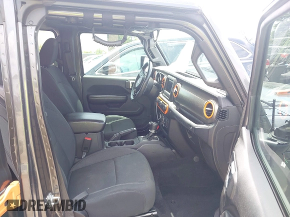 2019 Jeep Wrangler Unlimited Sport S with VIN 1C4HJXDN4KW577273, listed as a IAAI auction lot 42435847 with 69,403 mi miles and . Bid and sale history available at DreamBid. Image 5.
