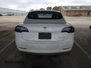 2022 Tesla Model 3 Long Range with VIN 5YJ3E1EB2NF267485, listed as a Copart auction lot 54952505 with 30,569 mi miles and Clean Title. Bid and sale history available at DreamBid. Image 6.