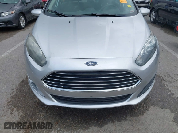 2017 Ford Fiesta S z VIN 3FADP4AJ1HM104006, wystawiony jako IAAI lot #41943413 z przebiegiem 111 873 mil mil oraz . Historia ofert i sprzedaży dostępna na DreamBid. Obrazek 12.