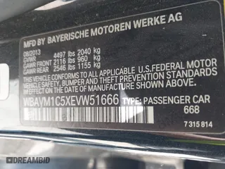 2014 BMW X1 sDrive28i with VIN WBAVM1C5XEVW51666, listed as a IAAI auction lot 42083936 with 176,465 mi miles. Bid and sale history available at carsss.com. Image 9.