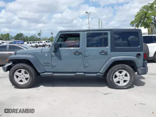 2015 Jeep Wrangler Unlimited Willys Wheeler with VIN 1C4BJWDG2FL730323, listed as a IAAI auction lot 41958605 with 75,192 mi miles. Bid and sale history available at carsss.com. Image 14.
