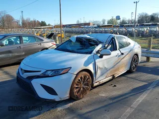 2018 Toyota Camry LE with VIN 4T1B11HK5JU565402, listed as a IAAI auction lot 41824110 with 105,659 mi miles. Bid and sale history available at carsss.com. Image 2.