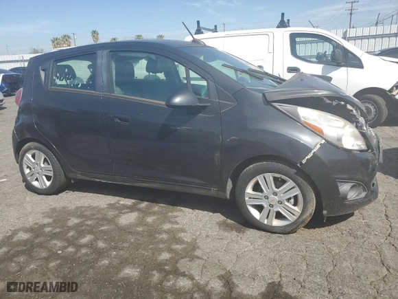 2015 Chevrolet Spark LS with VIN KL8CB6S9XFC800956, listed as a Copart auction lot 54062355 with 73,296 mi miles and Salvage Title. Bid and sale history available at carsss.com. Image 4.