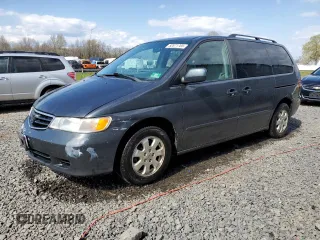2003 Honda Odyssey EX z VIN 5FNRL18663B095750, wystawiony jako Copart lot #52871785 z przebiegiem 198 965 mil mil oraz Szkoda całkowita • Salvage title. Historia ofert i sprzedaży dostępna na DreamBid. Obrazek 1.