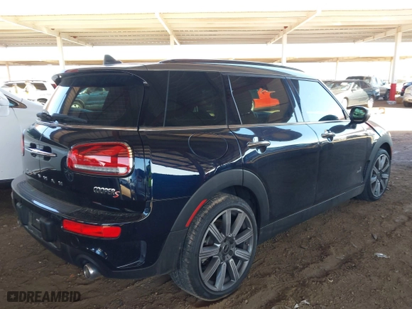 2023 MINI Clubman Cooper S with VIN WMWXJ1C07P2T62531, listed as a IAAI auction lot 41751201 with 27,343 mi miles. Bid and sale history available at carsss.com. Image 4.